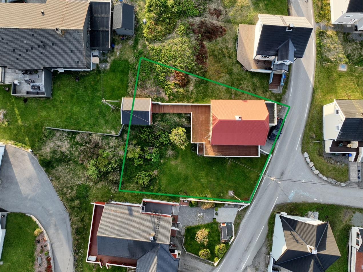 Tomtegrense markert med 720 m² eiet tomt